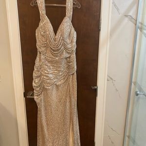 Silver evening gown never worn size 16